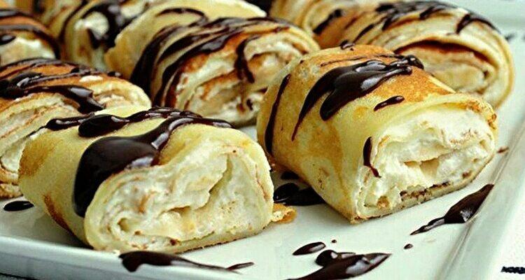 Млинці-рулетики з сирно-банановим кремом, рецепт приготування