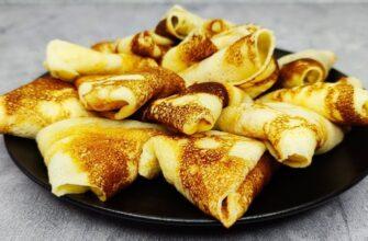 Тонкі млинці з грибною начинкою