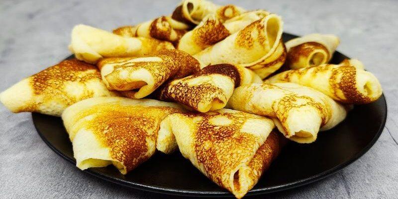 Тонкі млинці з грибною начинкою